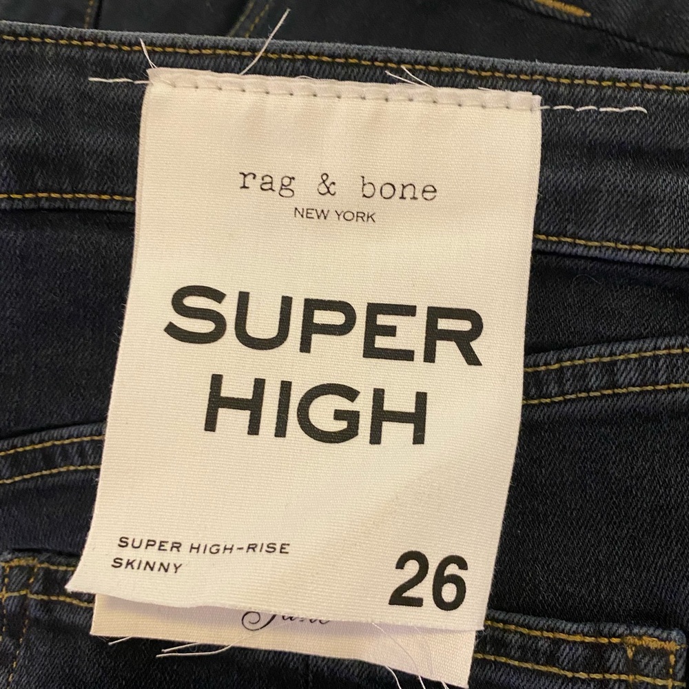 They are “super high rise” so pretty highwaist! The color is a really dark blue